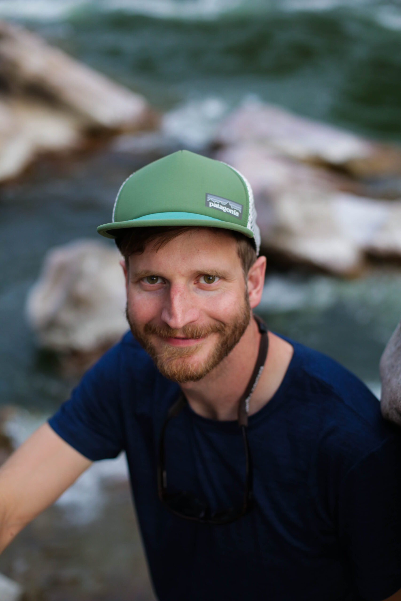 Dan Elsen of Elsen law, attorney, near a creek fishing